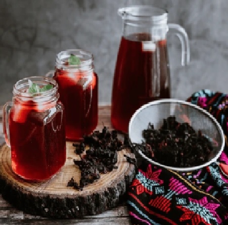 “Glass of refreshing agua de jamaica made with hibiscus petals, served chilled.”