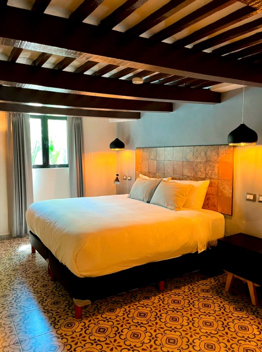 “A cozy room with soft lighting, warm textures, and a peaceful atmosphere ideal for relaxation.”